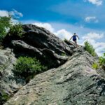 A day-hiker climbs to the highest point at Eastern Pinnacles.