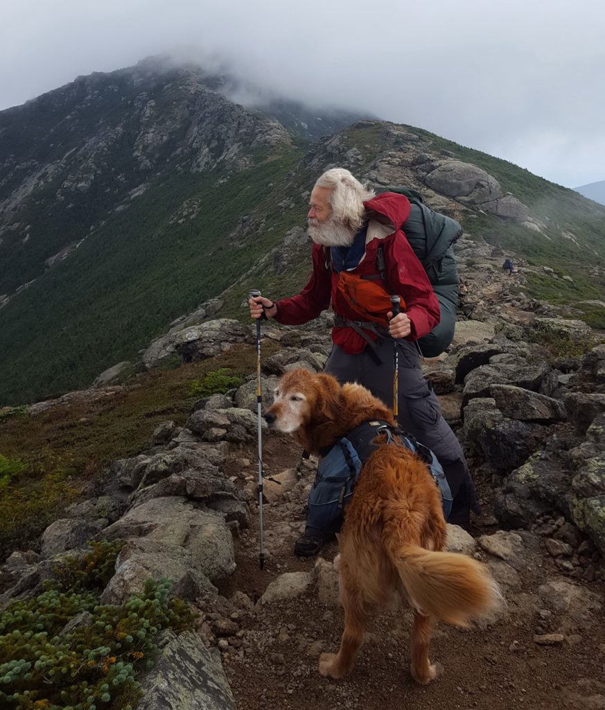 Soren West and his dog, Theo, on Franconia Ridge, New Hampshire.