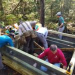 MATC volunteers build a privy