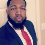 Head and shoulders photograph of Darian Rogers