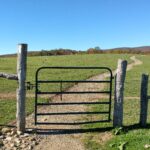 Metal gate closed and blocking Trail