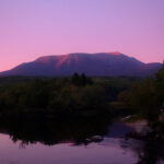 Katahdin at sunset, with a pink sky.