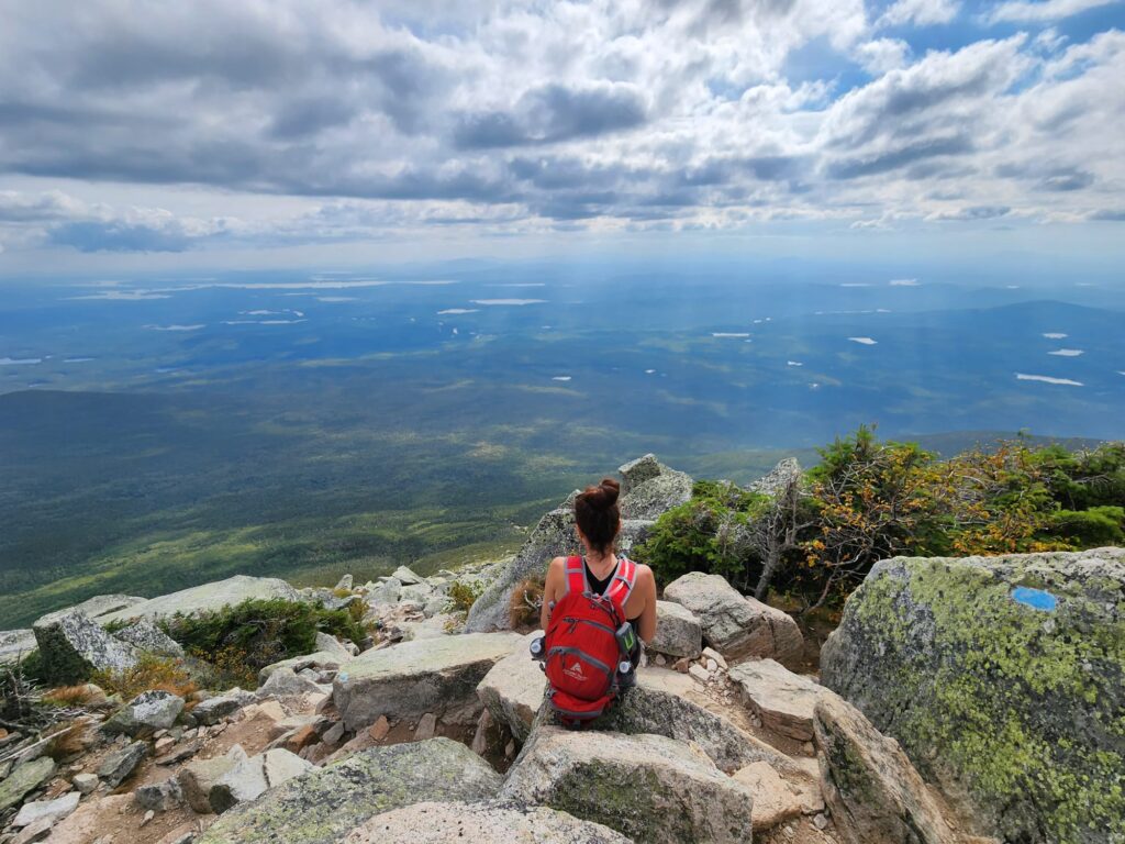 A hiker taking a break to enjoy the beautiful views along the A.T.