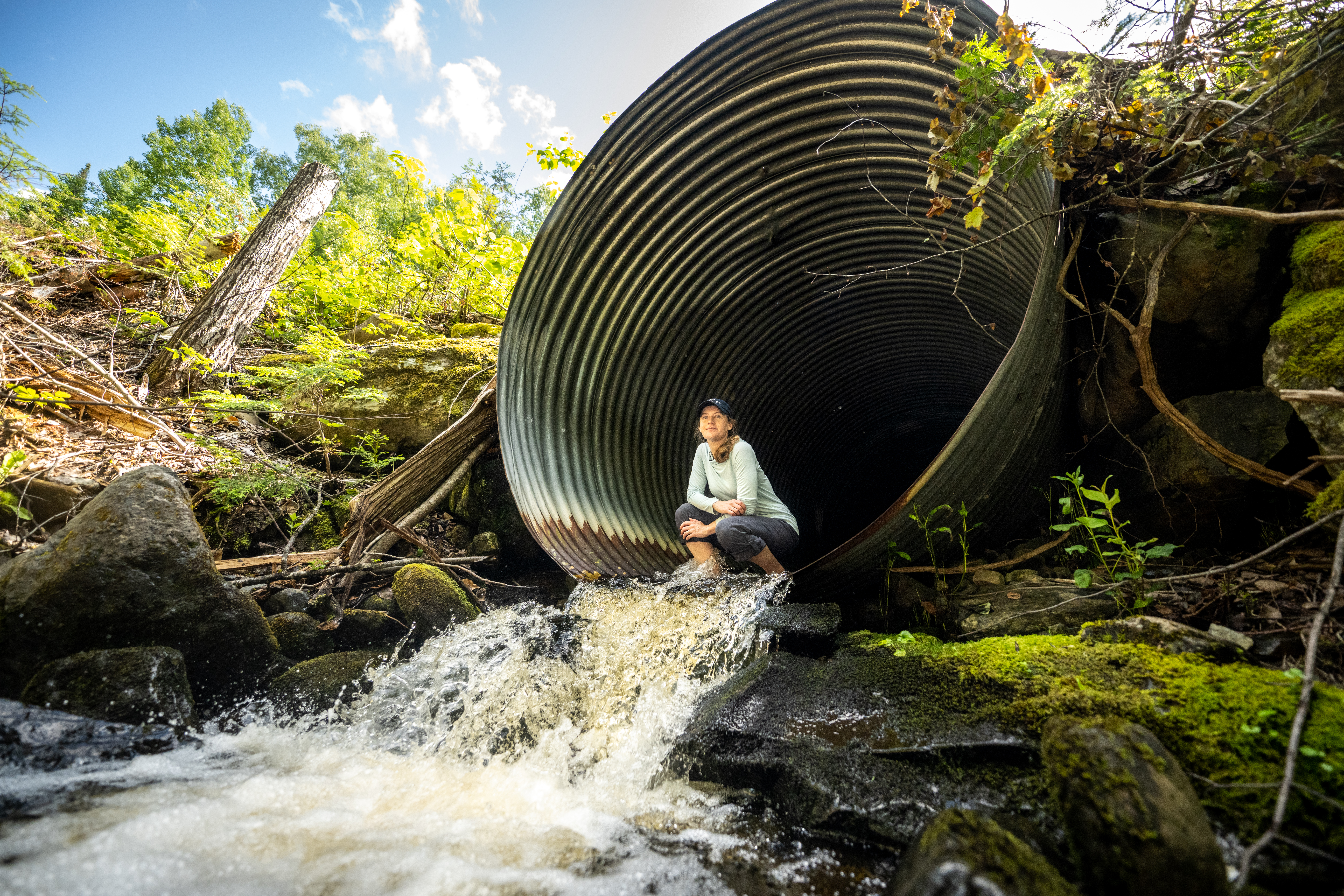 Marian Orlousky looks out from inside the former Henderson Brook culvert