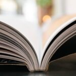 Book lying open, as seen from its side