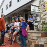 Visitors mingle outside of Appalachian Trail Conservancy Visitor Center building
