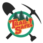 Trail Safe! logo featuring a shovel and pickaxe crossed behind the words Trail Safe. Evergreen trees above the text.