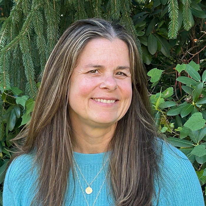 Cinda Waldbuesser professional headshot taken outdoors