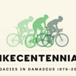 Poster with three cyclists in green tones above the bold title 'BIKECENTENNIAL' and subtitle 'LEGACIES IN DAMASCUS 1976-2026'.