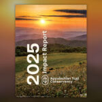 Vertical cover showing the 2025 Impact Report for the Appalachian Trail Conservancy, with a sunset over rolling hills and a grassy field and bold white vertical text reading '2025 Impact Report' alongside the organization’s logo.
